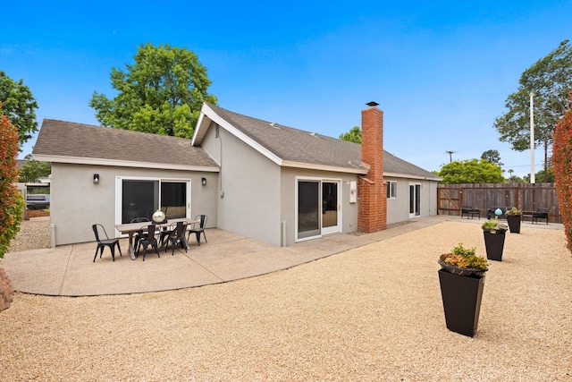 5668 Encina Rd, Goleta, CA 93117 - back of house with a patio area, stucco siding, and a shingled roof