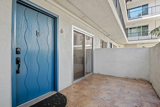 1701 Anacapa St Unit 6, Santa Barbara, CA 93101 - view of exterior entry with stucco siding