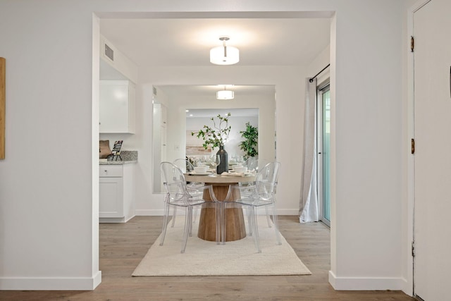 1701 Anacapa St Unit 6, Santa Barbara, CA 93101 - dining room featuring light wood-type flooring and baseboards