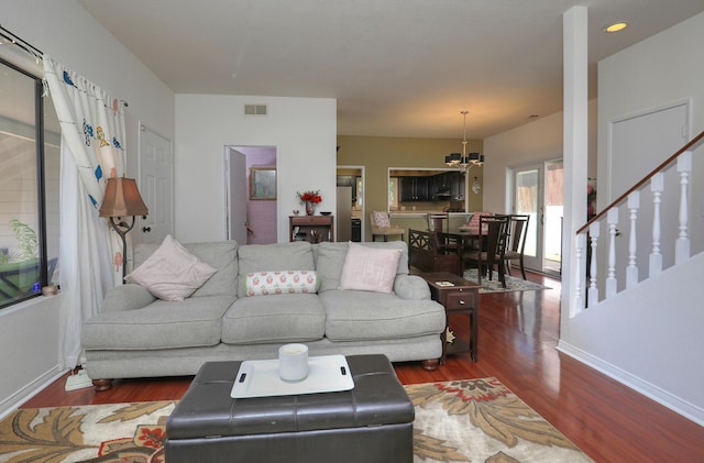 4014 Primavera Rd Unit A, Santa Barbara, CA 93110 - living room with wood finished floors, a chandelier, and stairs