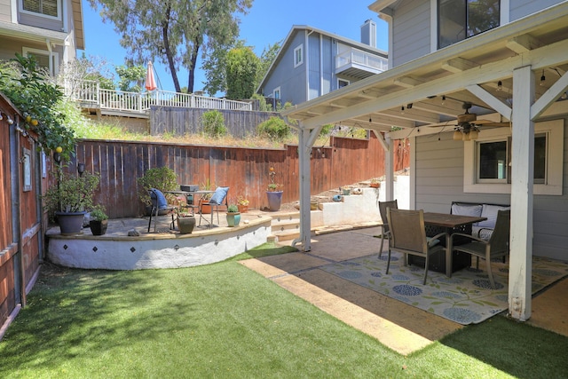 4014 Primavera Rd Unit A, Santa Barbara, CA 93110 - fenced backyard featuring a patio area, a ceiling fan, and outdoor dining space