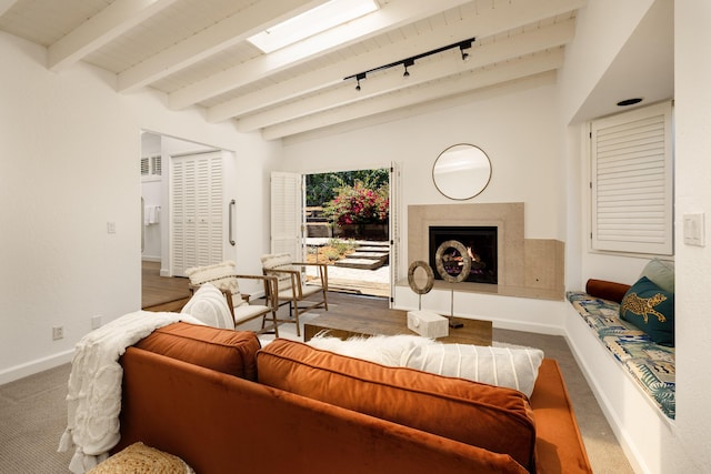 1330 W Valerio St, Santa Barbara, CA 93101 - carpeted living room with a premium fireplace and a wooden ceiling with exposed beams