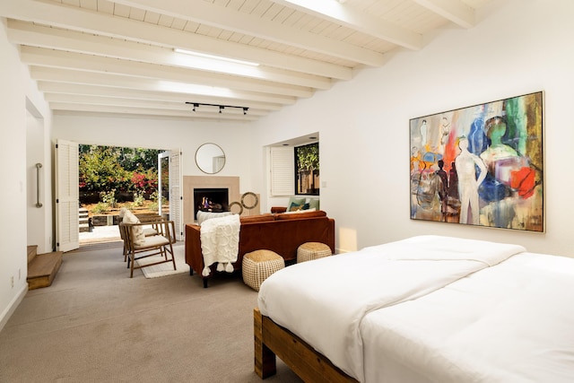 1330 W Valerio St, Santa Barbara, CA 93101 - bedroom featuring carpet flooring, beam ceiling, and a warm lit fireplace