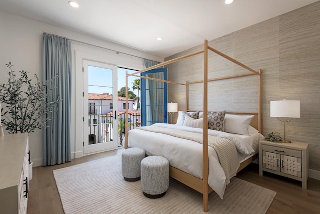 3718 State St Unit 314, Santa Barbara, CA 93105 - bedroom with access to exterior, recessed lighting, an accent wall, and wood finished floors