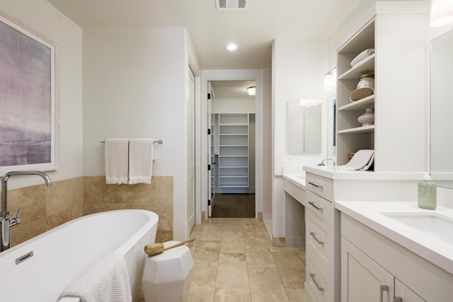3718 State St Unit 314, Santa Barbara, CA 93105 - full bath featuring vanity, a walk in closet, a soaking tub, and recessed lighting