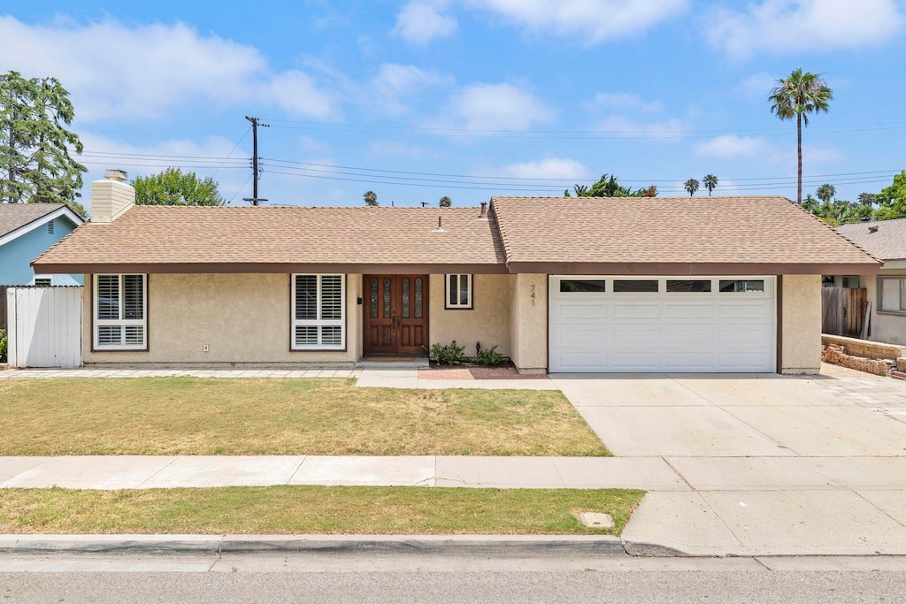 741 Kentwood Dr, Oxnard, CA 93030 - ranch-style home with a garage, concrete driveway, stucco siding, and roof with shingles