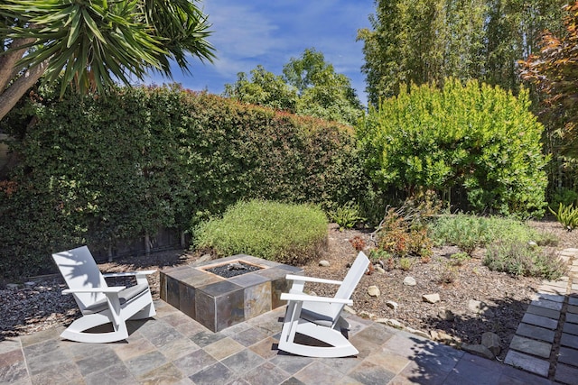 1138 Vallecito Rd, Carpinteria, CA 93013 - view of patio featuring an outdoor fire pit