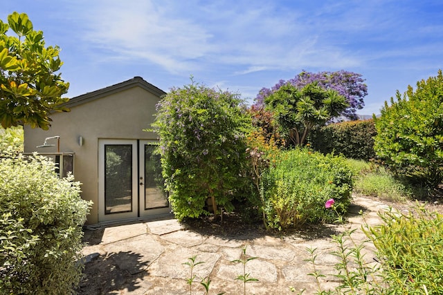 1138 Vallecito Rd, Carpinteria, CA 93013 - property entrance with stucco siding and french doors