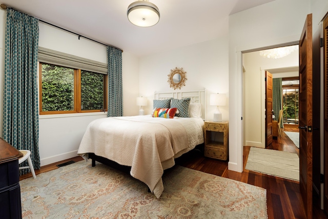 1138 Vallecito Rd, Carpinteria, CA 93013 - bedroom featuring wood finished floors and multiple windows