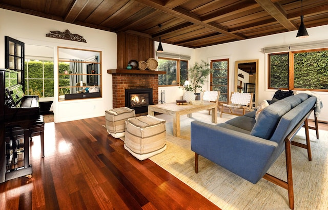 1138 Vallecito Rd, Carpinteria, CA 93013 - living area featuring a wood ceiling with exposed beams, wood finished floors, a fireplace, and coffered ceiling