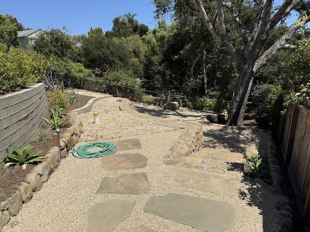 19 W Quinto St, Santa Barbara, CA 93105 - fenced backyard featuring a patio
