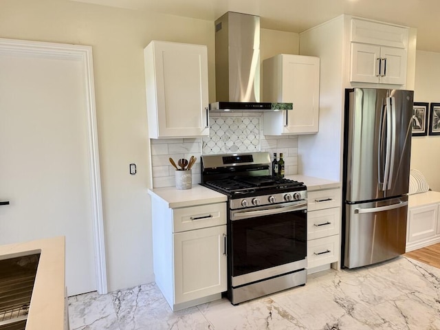 19 W Quinto St, Santa Barbara, CA 93105 - kitchen with appliances with stainless steel finishes, wall chimney exhaust hood, light marble finish floors, and light countertops