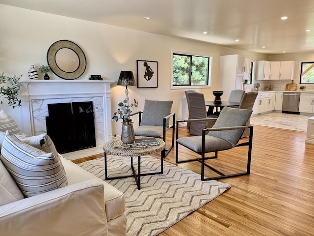 19 W Quinto St, Santa Barbara, CA 93105 - living room with light wood-type flooring, plenty of natural light, recessed lighting, and a high end fireplace