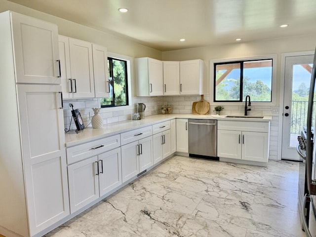 19 W Quinto St, Santa Barbara, CA 93105 - kitchen featuring dishwasher, healthy amount of natural light, tasteful backsplash, white cabinets, and recessed lighting