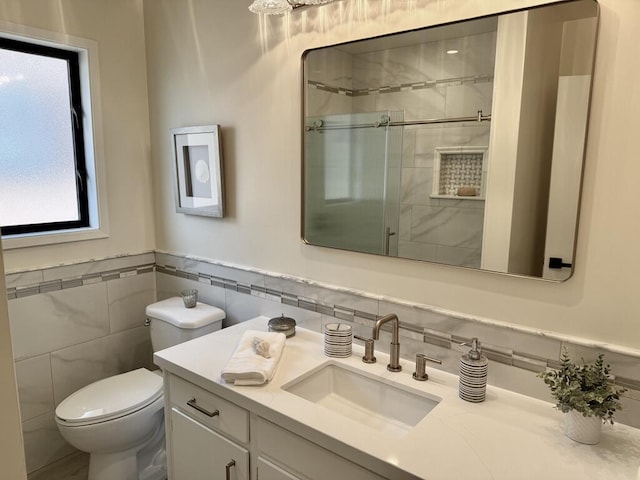 19 W Quinto St, Santa Barbara, CA 93105 - full bath with vanity, tile walls, a tile shower, and wainscoting