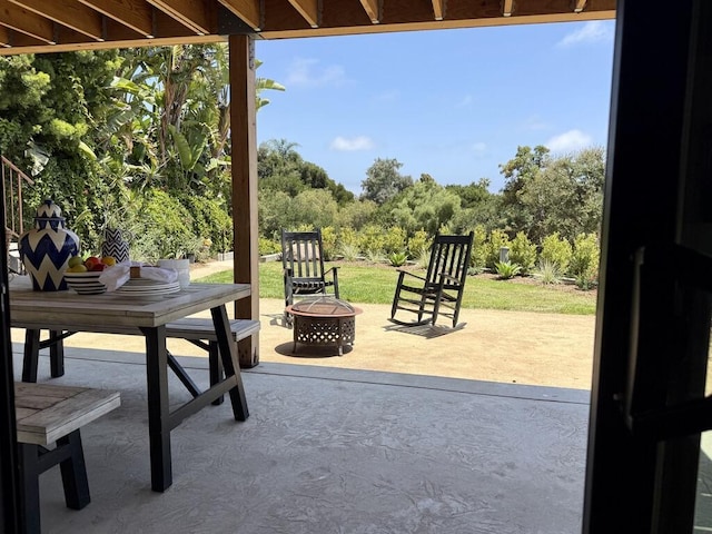 19 W Quinto St, Santa Barbara, CA 93105 - view of patio featuring an outdoor fire pit and view of wooded area