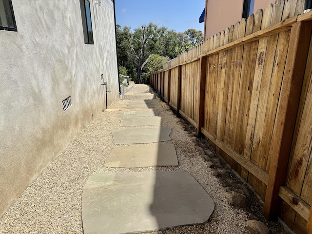 19 W Quinto St, Santa Barbara, CA 93105 - view of property exterior with stucco siding and a patio