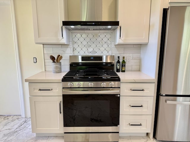 19 W Quinto St, Santa Barbara, CA 93105 - kitchen featuring stainless steel appliances, wall chimney range hood, backsplash, and white cabinetry