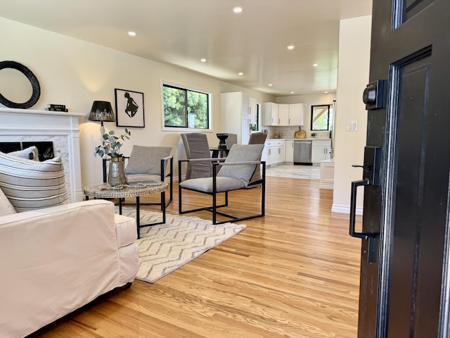 19 W Quinto St, Santa Barbara, CA 93105 - living room featuring plenty of natural light, light wood-type flooring, a premium fireplace, and recessed lighting