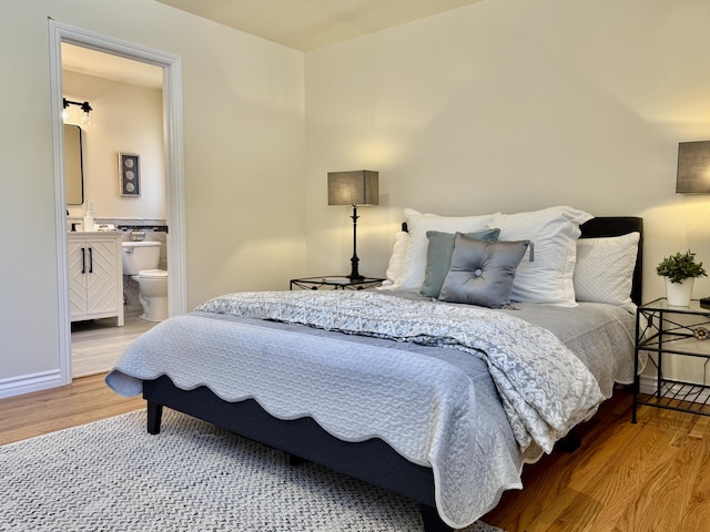19 W Quinto St, Santa Barbara, CA 93105 - bedroom with light wood finished floors and ensuite bathroom