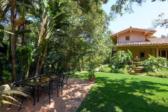 601 San Ysidro Rd, Santa Barbara, CA 93108 - view of grassy yard featuring a patio area and outdoor dining space