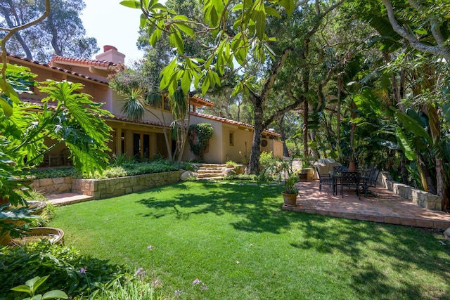 601 San Ysidro Rd, Santa Barbara, CA 93108 - view of green lawn with a patio