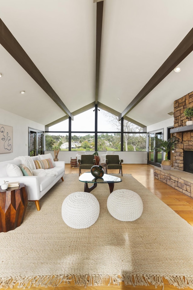 230 Avocado Pl, Camarillo, CA 93010 - living area featuring wood finished floors and a stone fireplace
