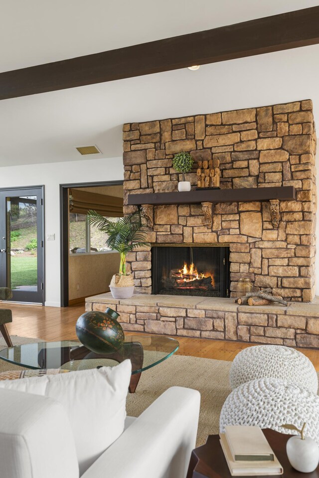 230 Avocado Pl, Camarillo, CA 93010 - living area with wood finished floors, beamed ceiling, and a fireplace