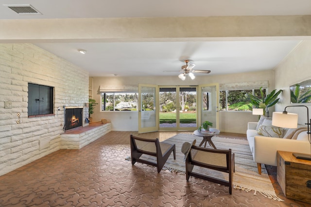 230 Avocado Pl, Camarillo, CA 93010 - living room featuring healthy amount of natural light, a fireplace, and ceiling fan