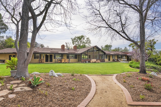 230 Avocado Pl, Camarillo, CA 93010 - back of property with a yard and a chimney