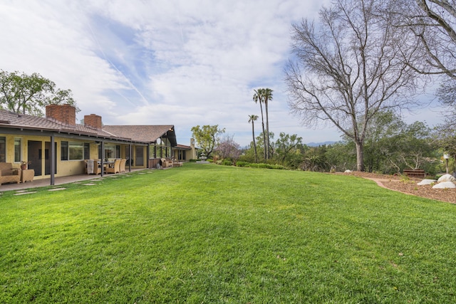 230 Avocado Pl, Camarillo, CA 93010 - view of green lawn featuring a patio
