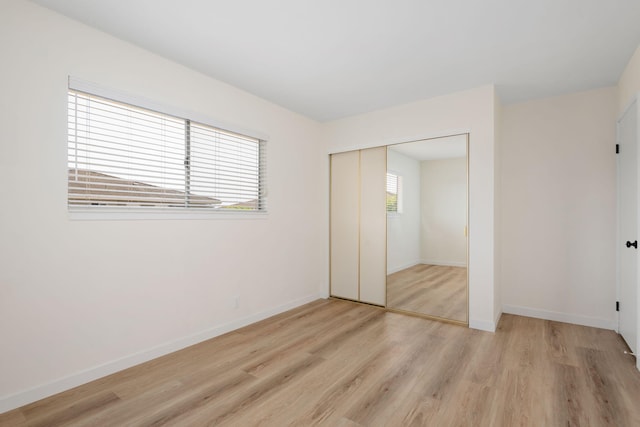 5925 Birch St Unit 4, Carpinteria, CA 93013 - unfurnished bedroom with a closet and light wood-style floors