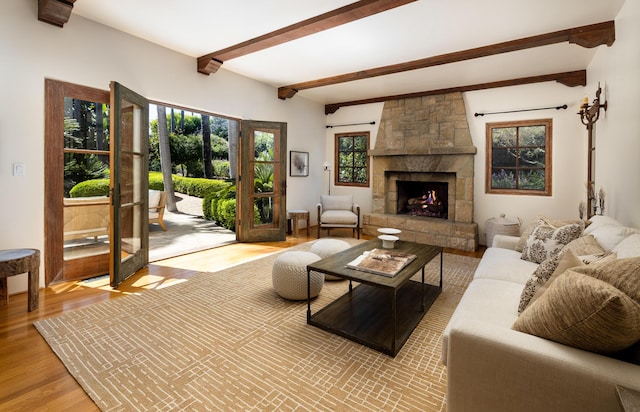 771 Via Manana, Montecito, CA 93108 - living room featuring beamed ceiling, a fireplace, and light wood-type flooring