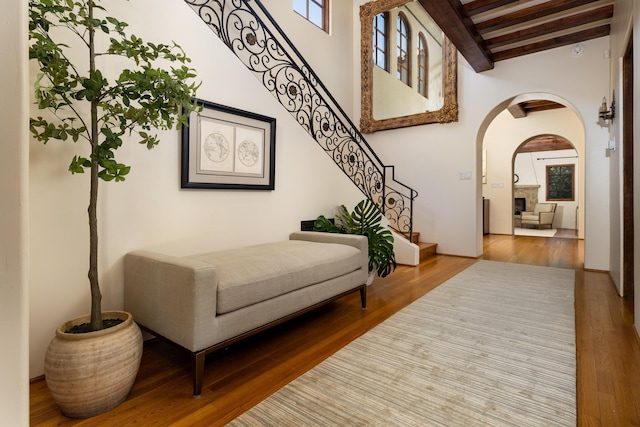 771 Via Manana, Montecito, CA 93108 - entrance foyer with arched walkways, beamed ceiling, wood finished floors, stairs, and a high ceiling