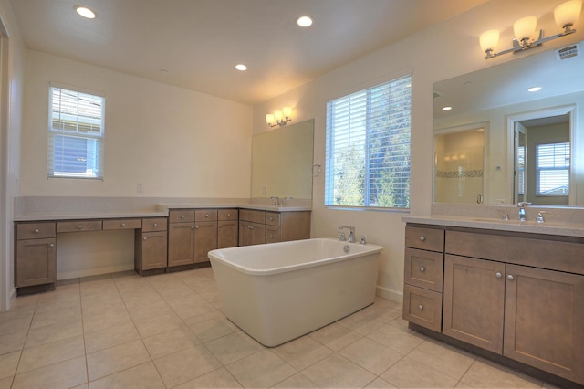 6628 Sand Castle Pl Unit C-7, Goleta, CA 93117 - bathroom with plenty of natural light, a freestanding tub, vanity, and recessed lighting
