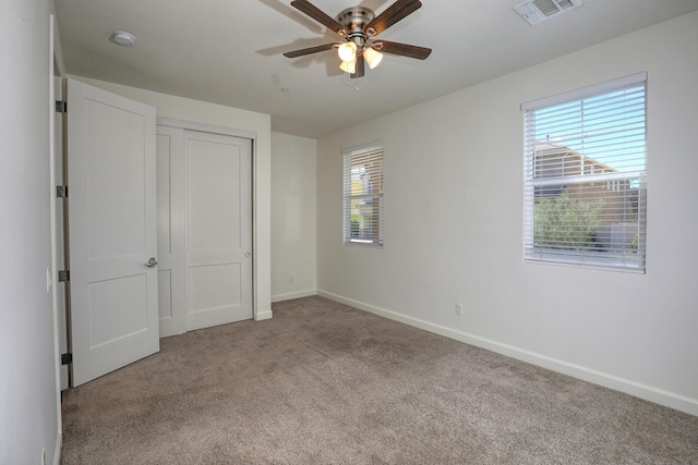 6628 Sand Castle Pl Unit C-7, Goleta, CA 93117 - unfurnished bedroom featuring carpet flooring, a closet, and a ceiling fan