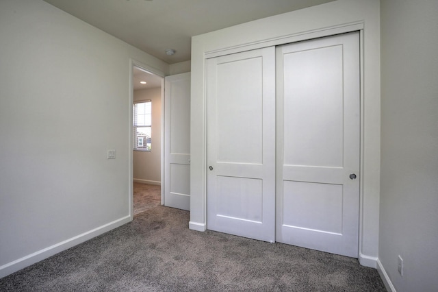 6628 Sand Castle Pl Unit C-7, Goleta, CA 93117 - unfurnished bedroom featuring carpet floors, a closet, and recessed lighting