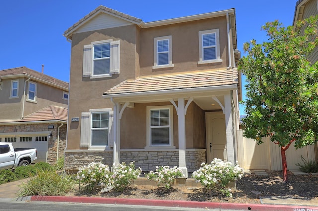 6628 Sand Castle Pl Unit C-7, Goleta, CA 93117 - view of front facade featuring stone siding and stucco siding