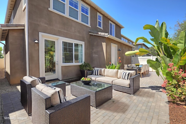 6628 Sand Castle Pl Unit C-7, Goleta, CA 93117 - view of patio / terrace with an outdoor living space and outdoor dining area