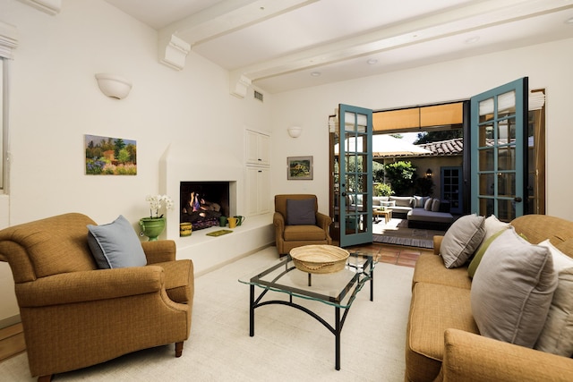 1439 Tunnel Rd, Santa Barbara, CA 93105 - living area featuring french doors, beamed ceiling, and a warm lit fireplace