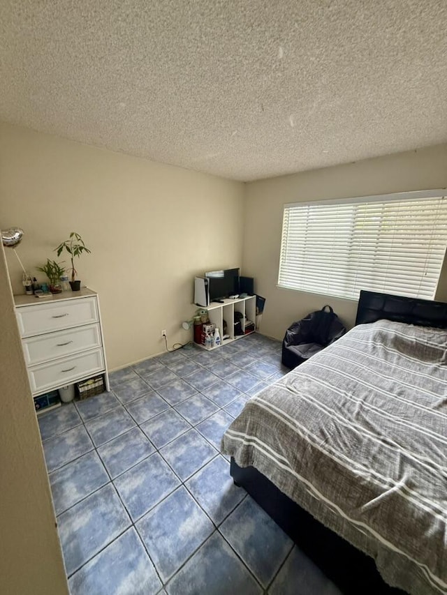 701 Halyard St, Port Hueneme, CA 93041 - tiled bedroom with a textured ceiling