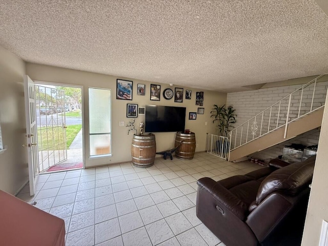 701 Halyard St, Port Hueneme, CA 93041 - tiled living room with stairway and a textured ceiling
