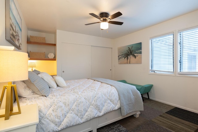 521 W Montecito St Unit 4, Santa Barbara, CA 93101 - bedroom with a closet, multiple windows, dark carpet, and ceiling fan