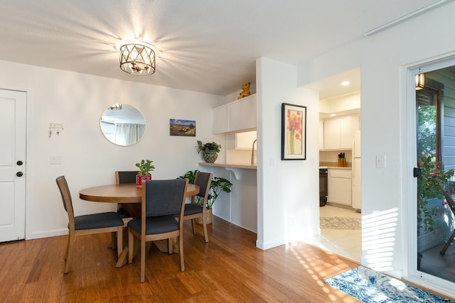 521 W Montecito St Unit 4, Santa Barbara, CA 93101 - dining space featuring light wood-type flooring
