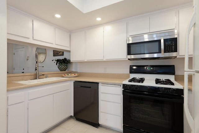 521 W Montecito St Unit 4, Santa Barbara, CA 93101 - kitchen with stainless steel microwave, black dishwasher, range with gas cooktop, light countertops, and white cabinets