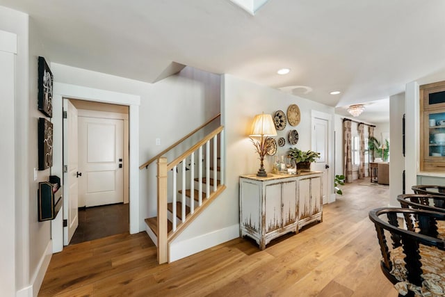 2807 Gaviota St, Los Olivos, CA 93441 - entryway with light wood finished floors, stairway, and recessed lighting