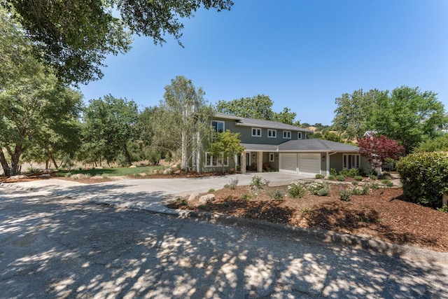2807 Gaviota St, Los Olivos, CA 93441 - view of front of home featuring concrete driveway and an attached garage