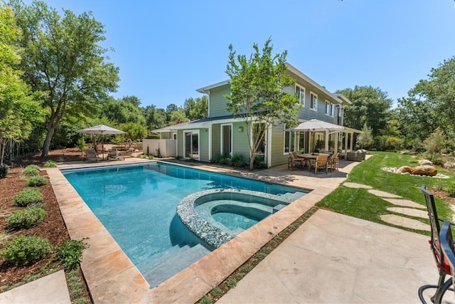 2807 Gaviota St, Los Olivos, CA 93441 - view of pool with outdoor dining area, a patio, a pool with connected hot tub, and a yard