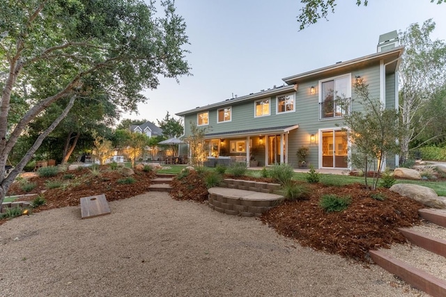 2807 Gaviota St, Los Olivos, CA 93441 - rear view of house featuring a chimney and a patio area