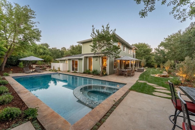 2807 Gaviota St, Los Olivos, CA 93441 - view of pool featuring outdoor dining area, a patio area, and a pool with connected hot tub